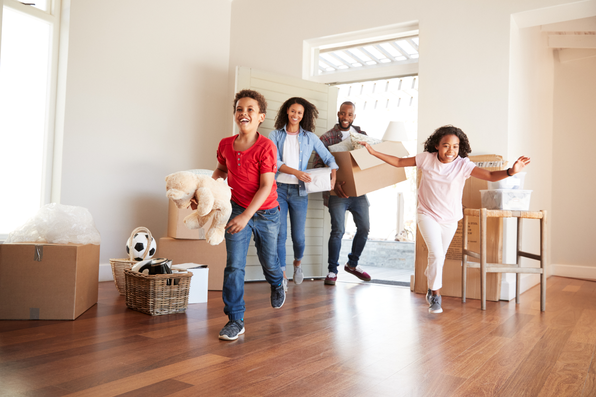 Happy family moving into their new home